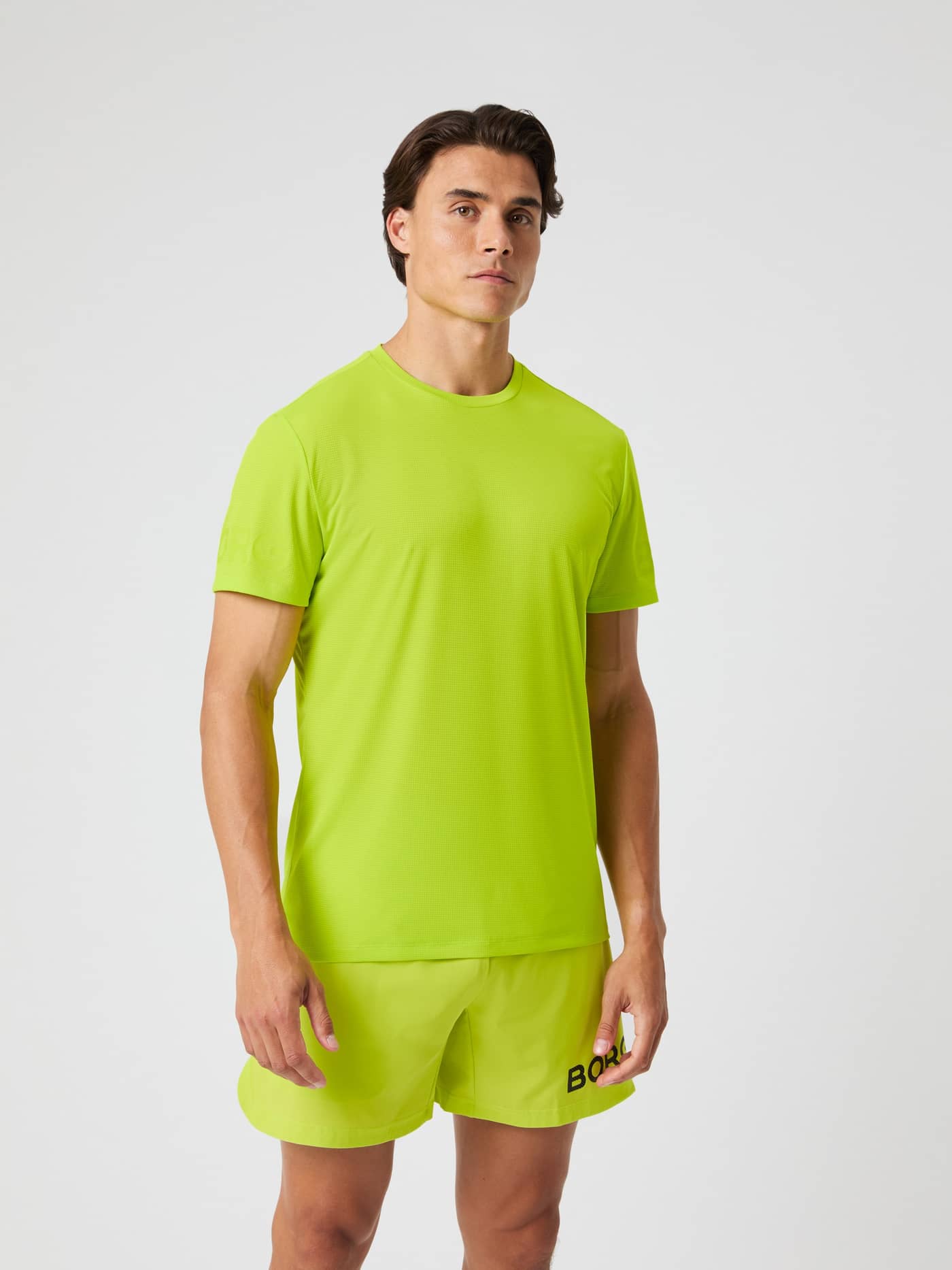 Borg Light T-Shirt i Acid Lime (Grön) för herrar sedd framifrån, en funktionell träningströja för tennis och träning. - Image 1