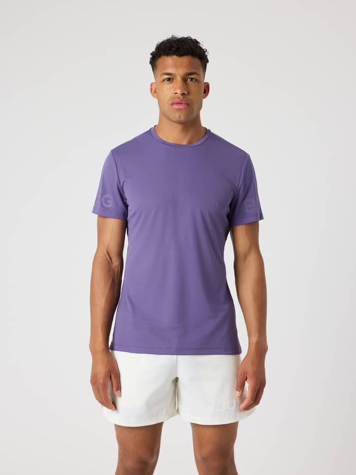 Front view of a man wearing the Mystical (Purple) Borg Light T-Shirt, a functional training top with a regular fit.