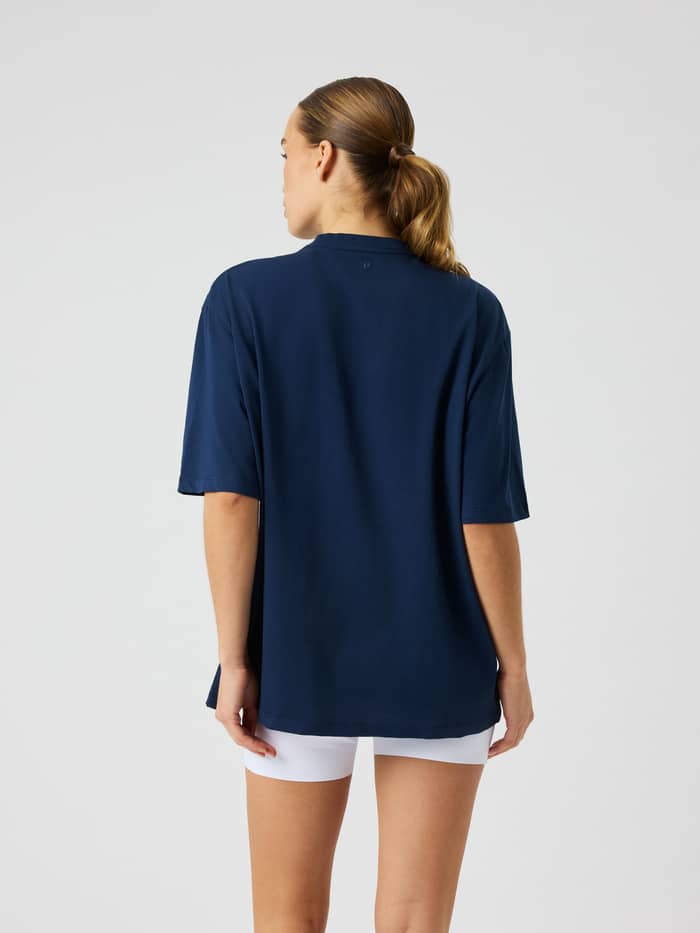 Back view of the Borg Studio Oversized T-Shirt in Dress Blues (Blue) featuring a loose fit and round neck.