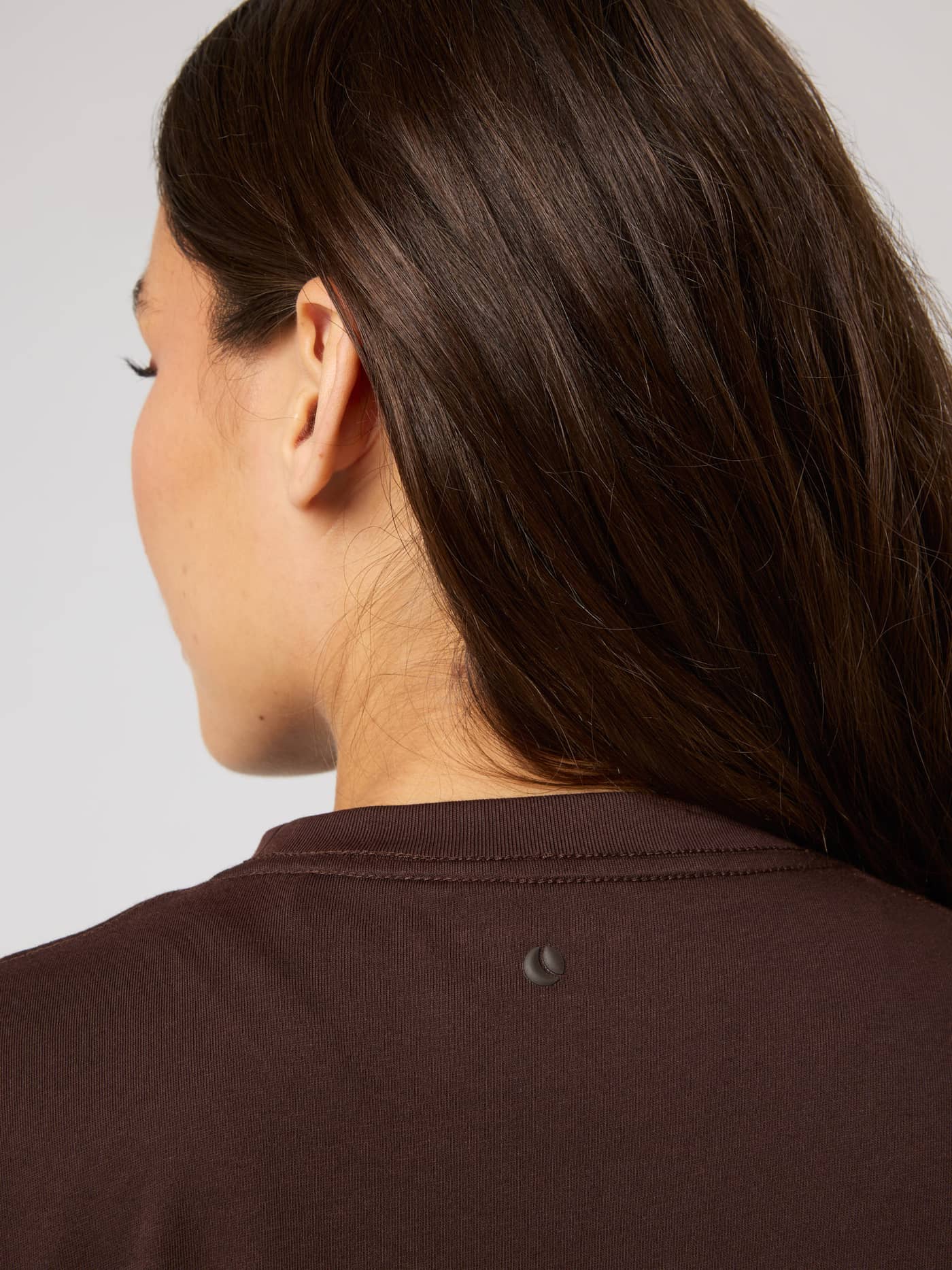 Studio Oversized T-Shirt in Coffee Bean (Brown) featuring a subtle tennis ball logo print on the back neck. - Image 4