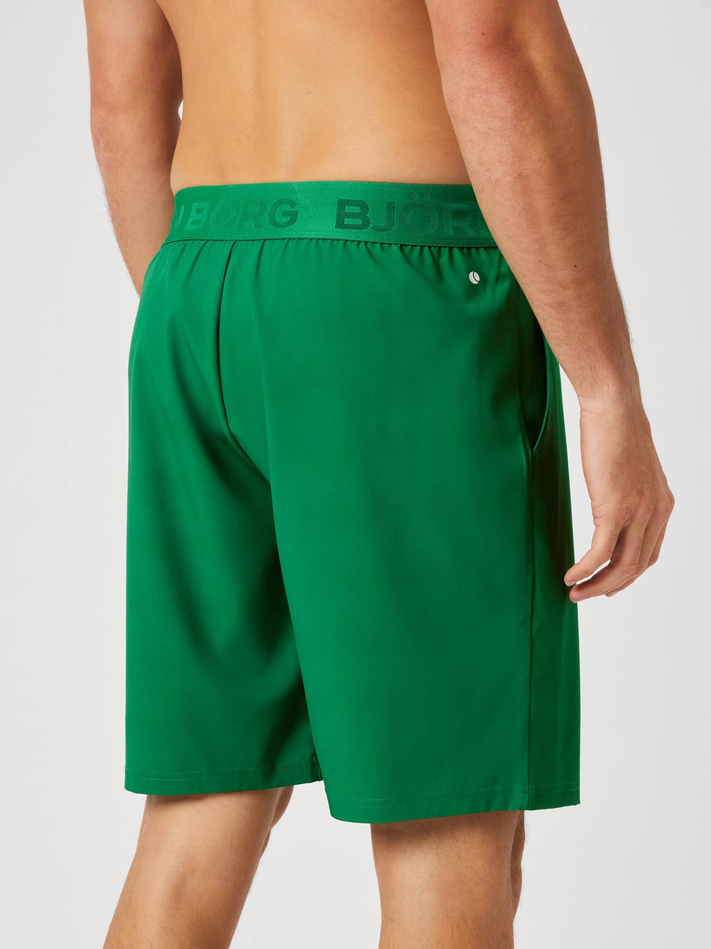 Back view of the Borg Shorts 9 Inch in Jolly Green (green) highlighting the elastic logo waistband for training. - Image 2