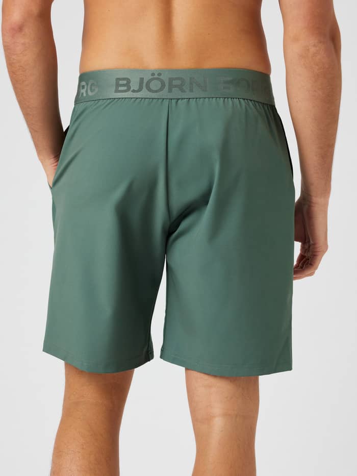 Back view of the Borg Shorts 9 Inch in Laurel Wreath (green) for training, featuring an elastic logo waistband.
