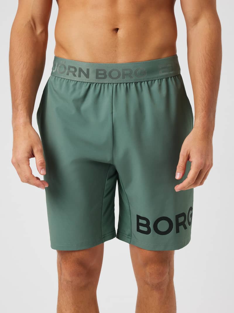 Borg Shorts 9 Inch in Laurel Wreath (green) featuring the elastic logo waistband and black logo print for training.