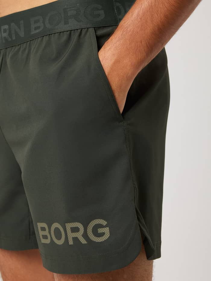 Borg Shorts 6 Inch en Rosin (Vert) avec taille griffée, poche et logo pour l'entraînement technique. - Image 4