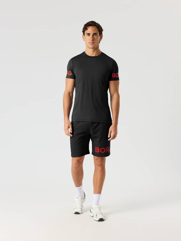 Borg T-Shirt in Black Orange Logo (Zwart) voor training, getoond in een volledig vooraanzicht. - Image 4