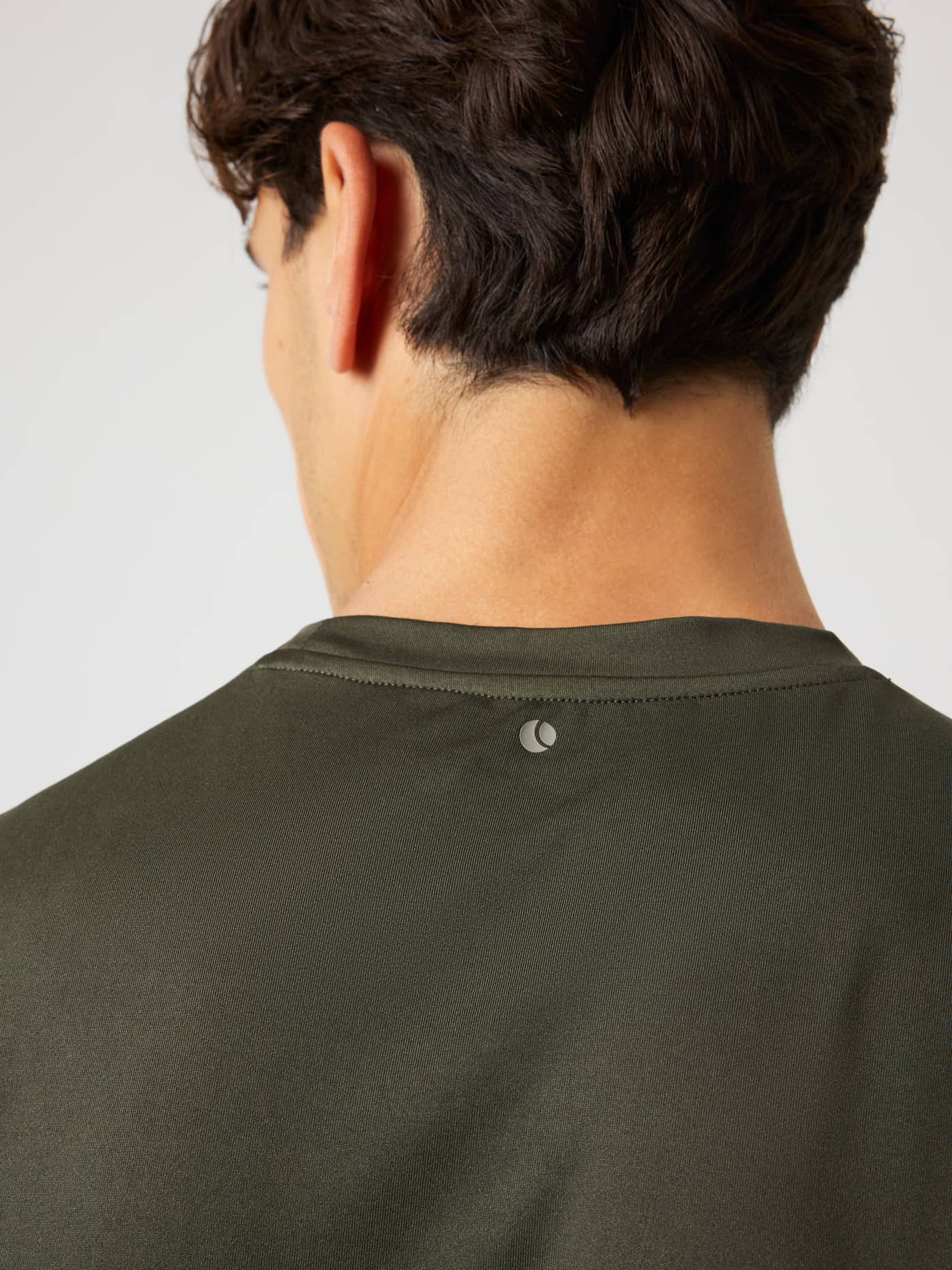 Detailed back view of the Borg T-Shirt in Rosin (Green) featuring a grey tennis ball print for training and tennis. - Image 5