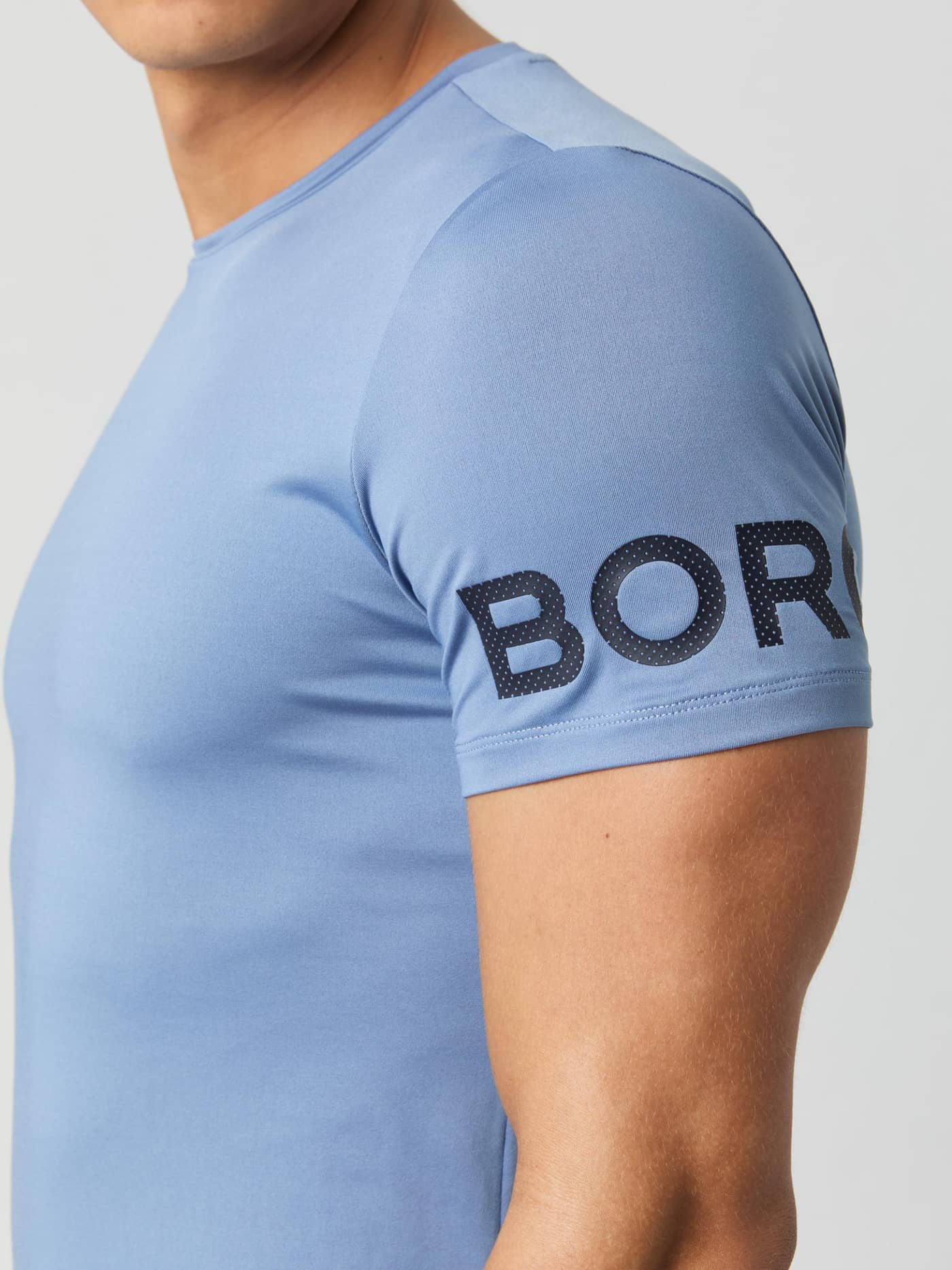 Close-up of the Borg T-Shirt in Stonewash, showing the iconic Borg logo on the sleeve. - Image 1