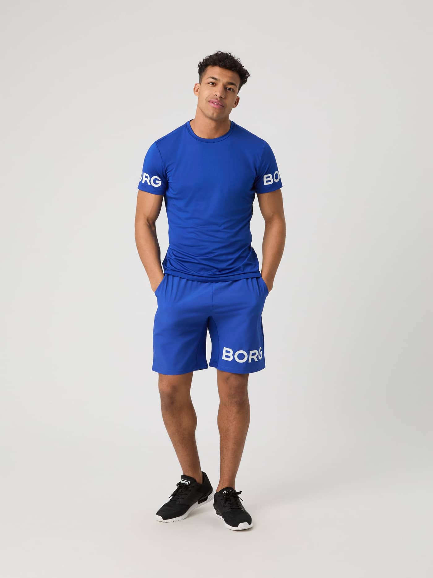 Full body shot of a model wearing the blue Björn Borg Borg T-shirt with matching shorts. - Image 3
