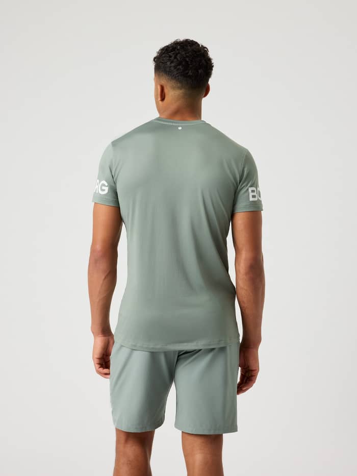 Back view of a model wearing the Björn Borg Borg T-Shirt in agave green.