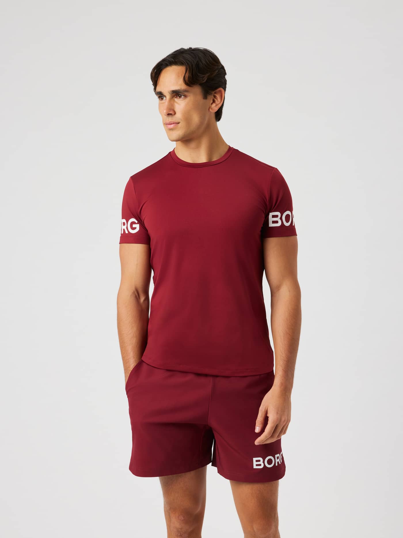 Borg T-Shirt in Cabernet (red) featuring a round neck and white logo print on the sleeves for training. - Image 3