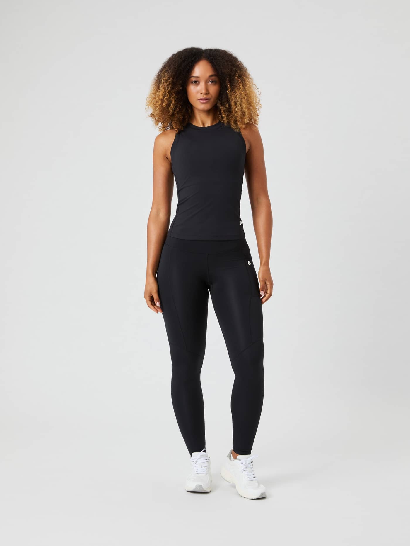Full body front view of a model wearing the black Ace Pocket Ribbed Tank Top. - Image 3