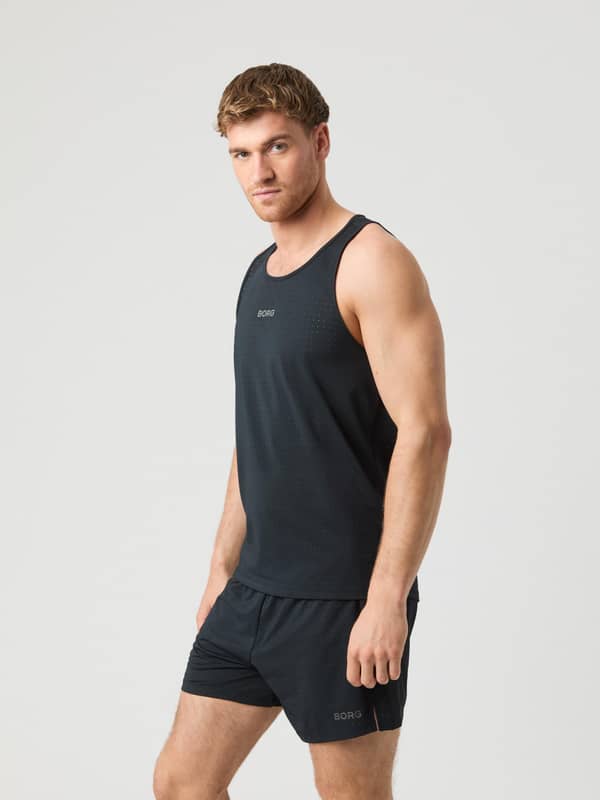 Vue de côté du Borg Running Perforated Tank en Black Beauty (Noir), débardeur respirant pour le running et l'entraînement.