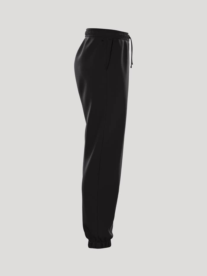 Borg Essential 1 Sweatpants i Black Beauty (Sort) set fra siden med en løs pasform, sidelomme og elastiske manchetter. - Image 3