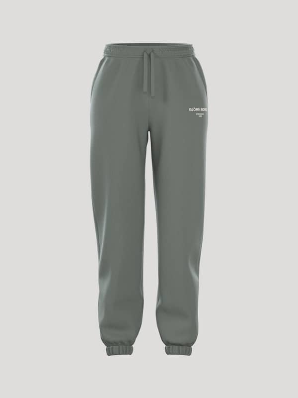 Front view of the women's Borg Essential 1 Sweatpants in Agave Green (Green), featuring a loose fit and soft fleece.