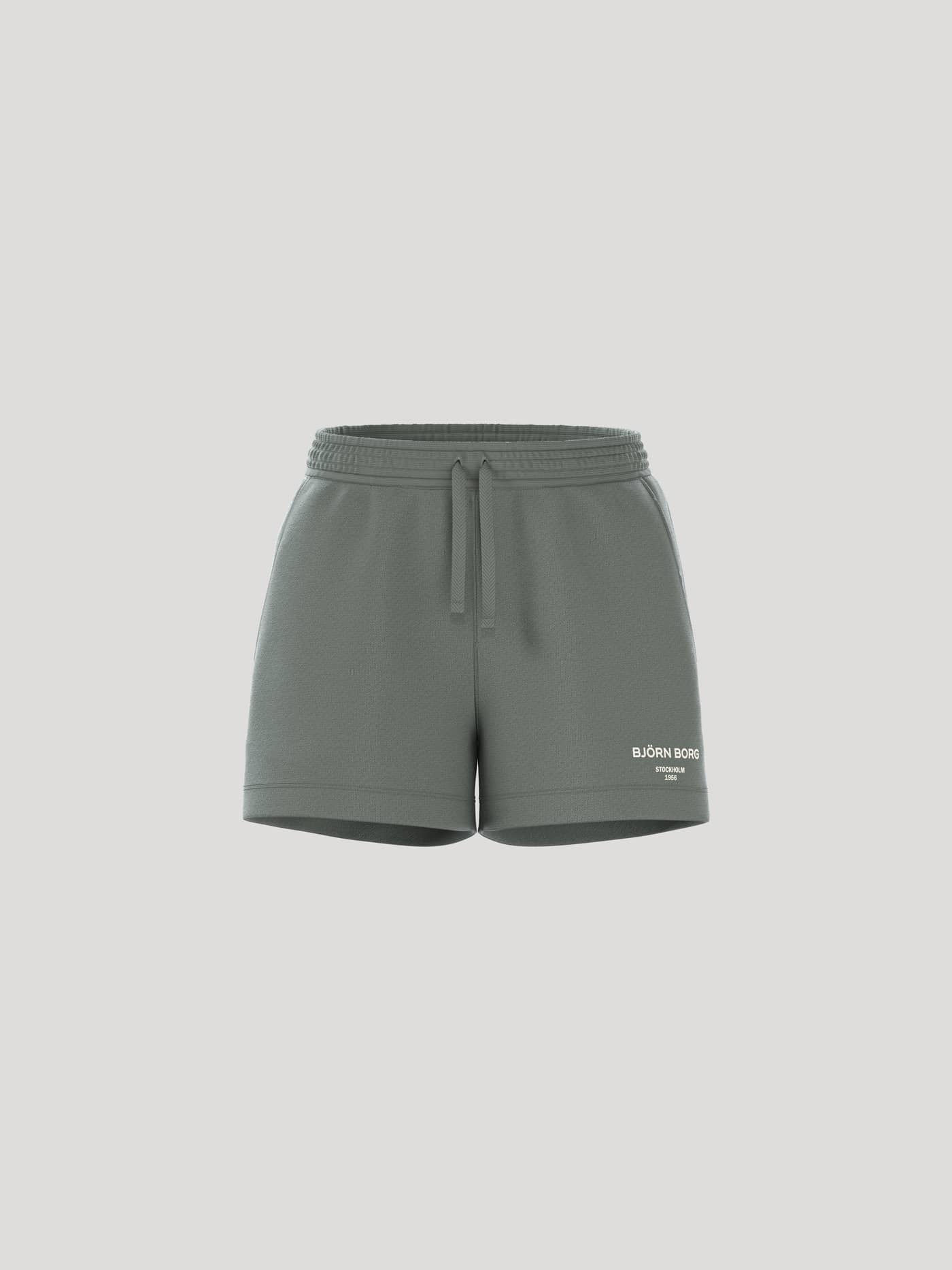 Borg Essential 1 Sweatshorts in Agave Green (Groen) met een losse pasvorm en wit logodetail, in vooraanzicht. - Image 1