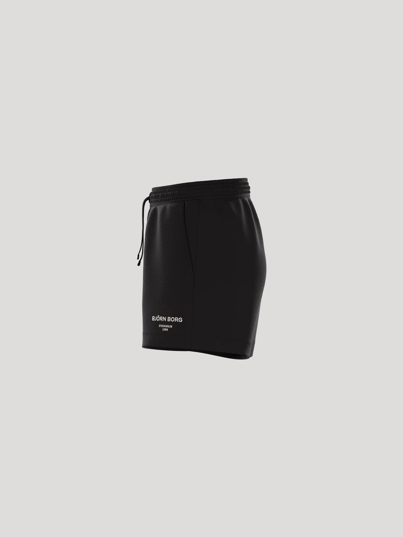 Side view of the Borg Essential 1 Sweatshorts in Black Beauty (Black), featuring a white logo and adjustable drawstring. - Image 4