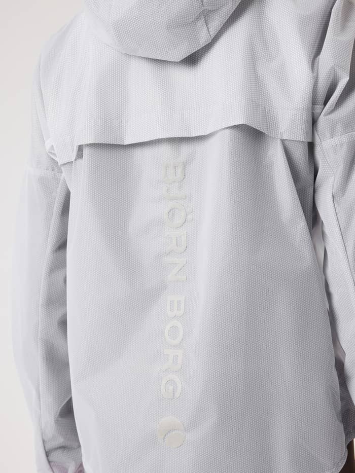 Back view of the Borg Running Jacket in Brilliant White (White) for running, with a silver logo and hexagonal texture. - Image 4