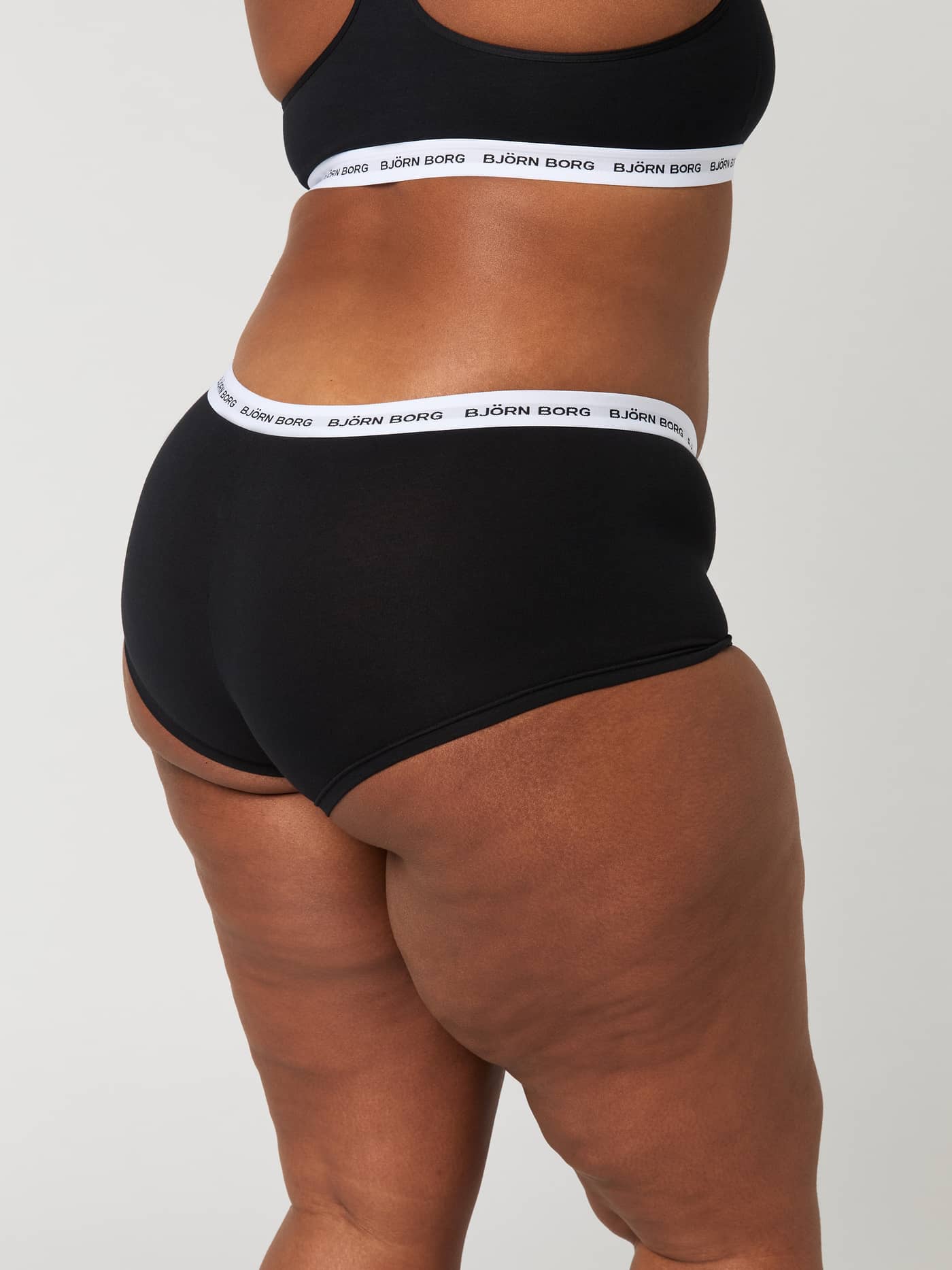 Logo Boxer Shorts 5-pack i Sort med hvid elastiklinning med logo i bomuldsstretch set fra siden. - Image 8