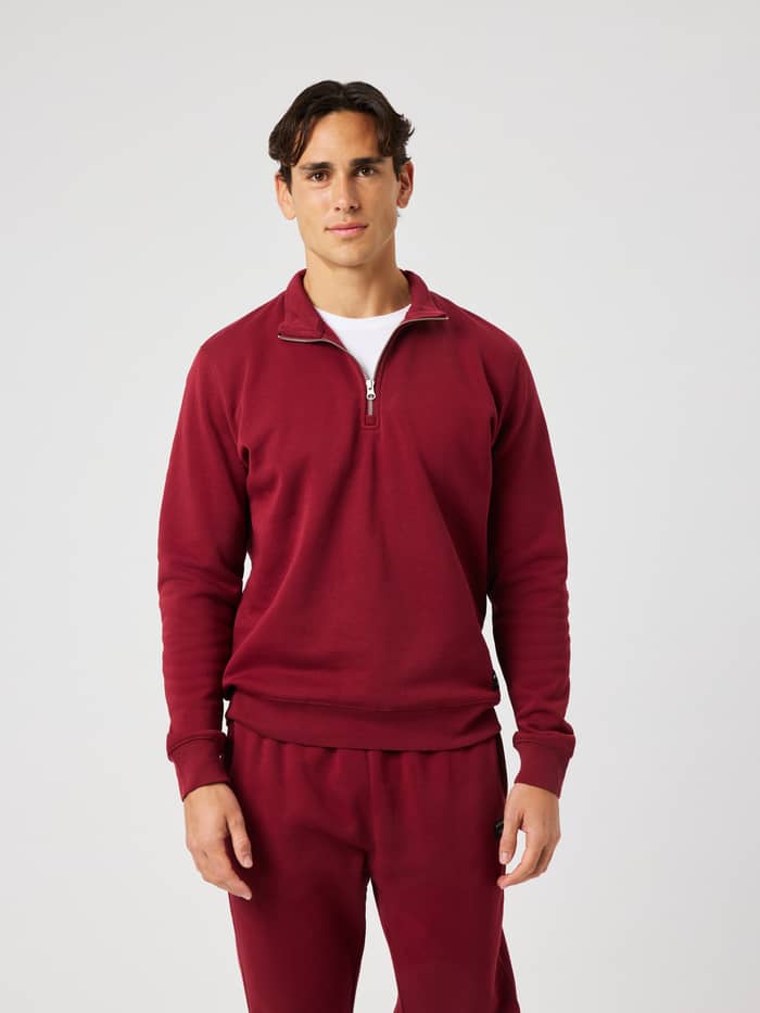 Front view of the Centre Half Zip in Cabernet (Burgundy) featuring a half-zip front and ribbed details.