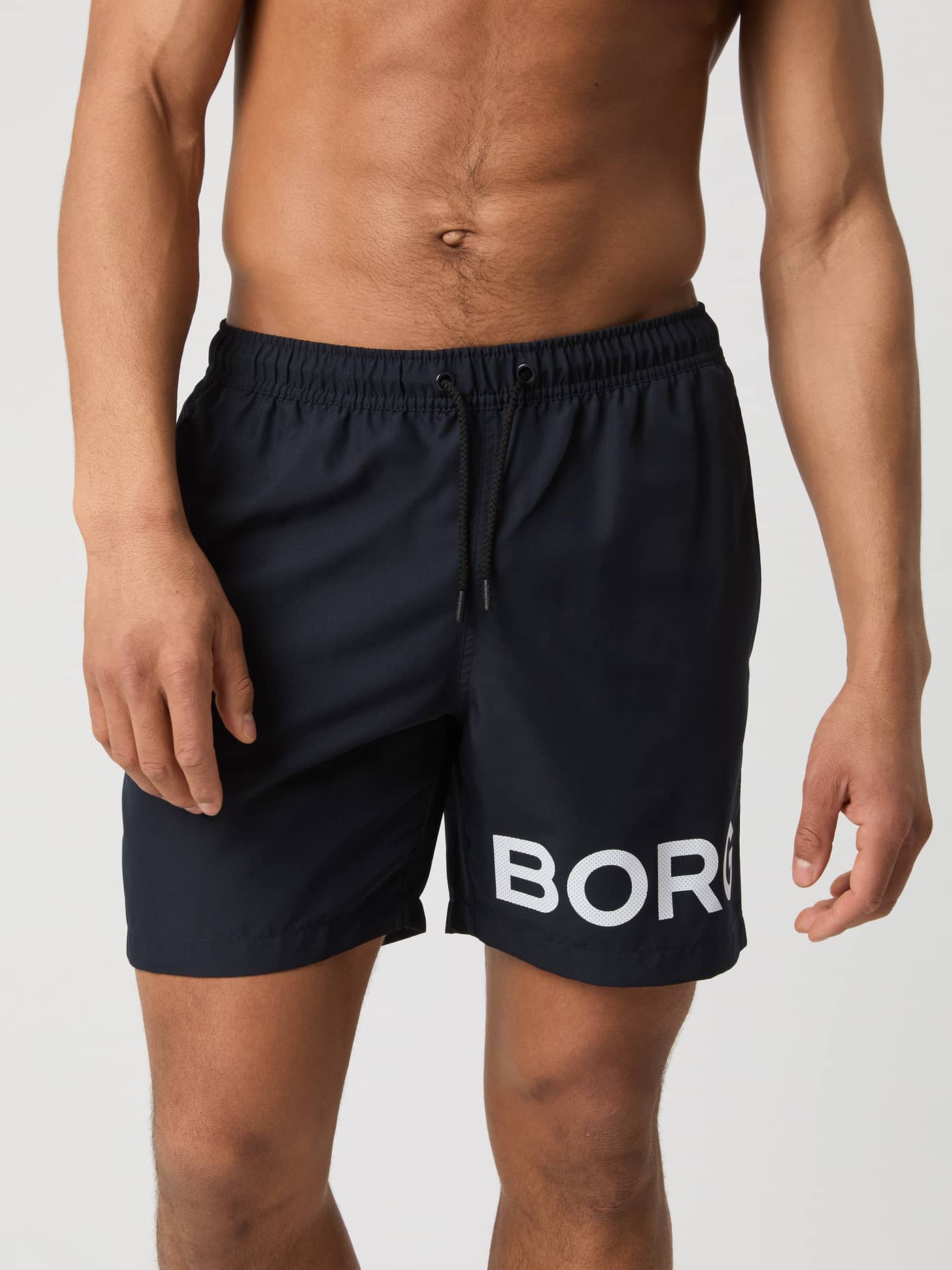 Borg Swim Shorts in Night sky (Marineblauw) met een opvallend wit logo en trekkoord, getoond in vooraanzicht. - Image 2