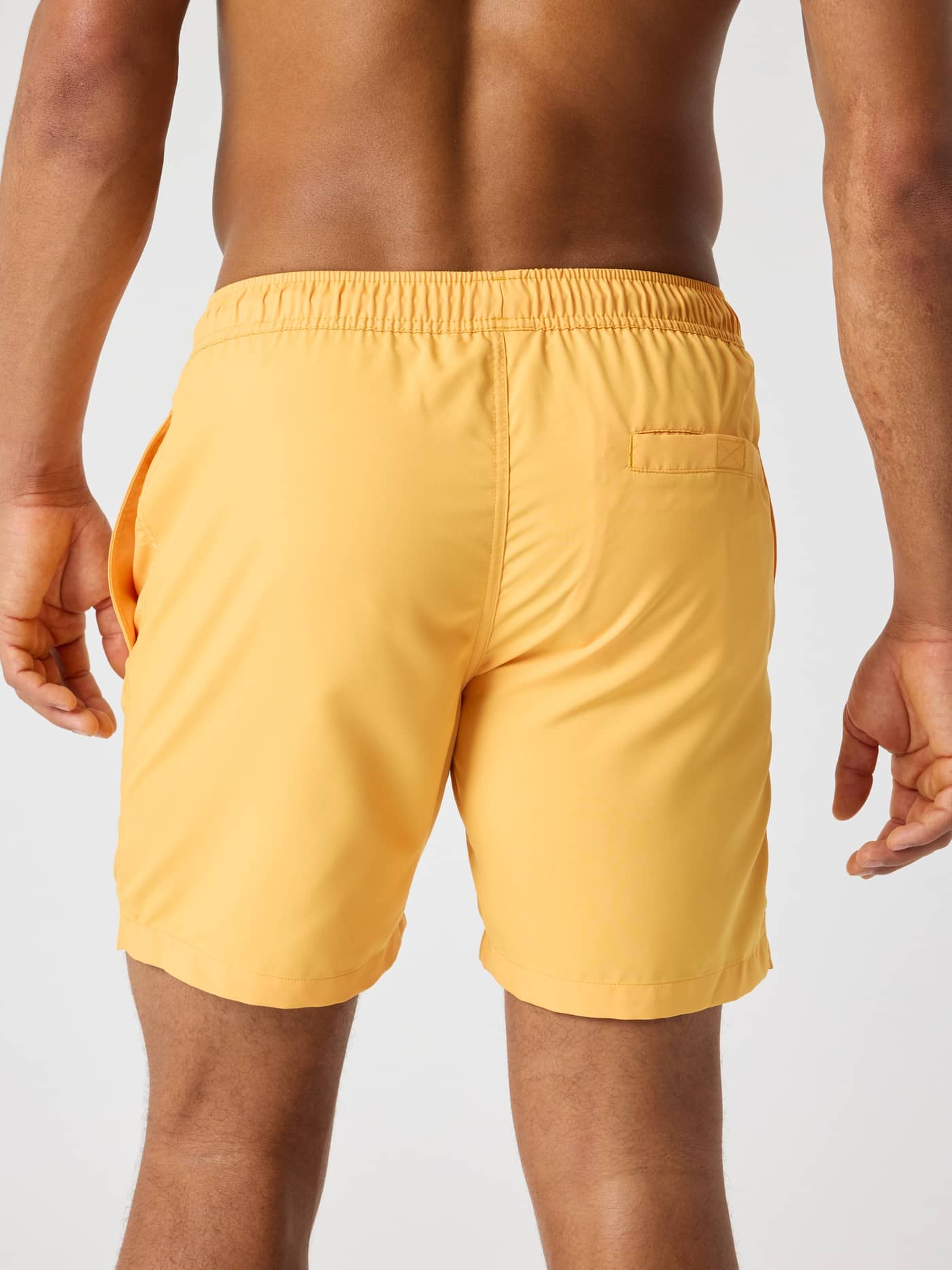 Borg Swim Shorts in Marigold (Gelb) in der Rückansicht mit funktionaler Gesäßtasche und normaler Passform. - Image 2