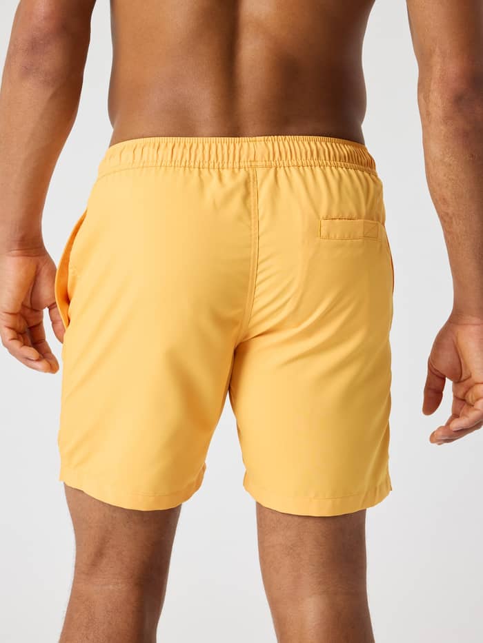 Borg Swim Shorts in Marigold (Geel) in achteraanzicht met een functionele achterzak en een regular fit. - Image 2