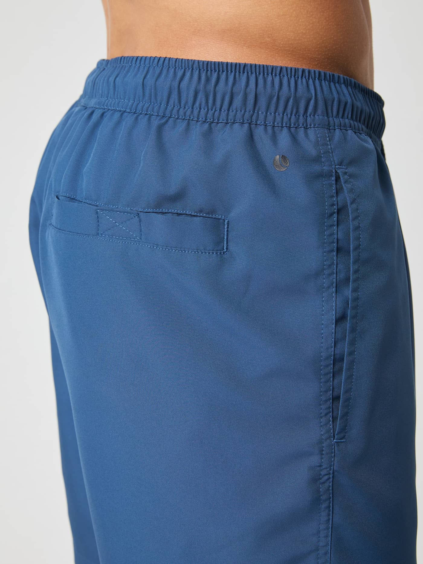 Close-up of the Borg Swim Shorts in Sargasso Sea (Blue), highlighting the side pocket and functional back pocket. - Image 5