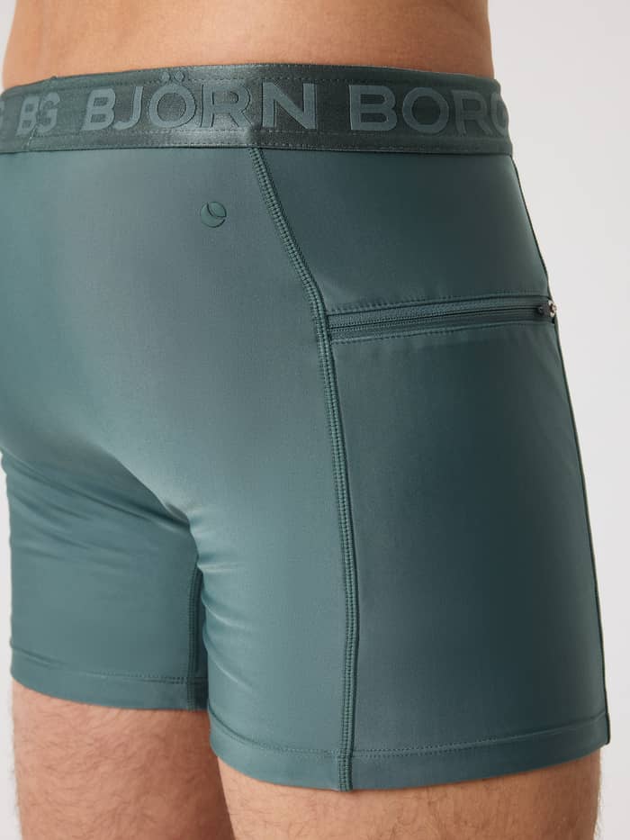Borg Stretch Swim Shorts in Balsam Green (Groen) met handige ritszak en tennisbalprint in zijaanzicht. - Image 4