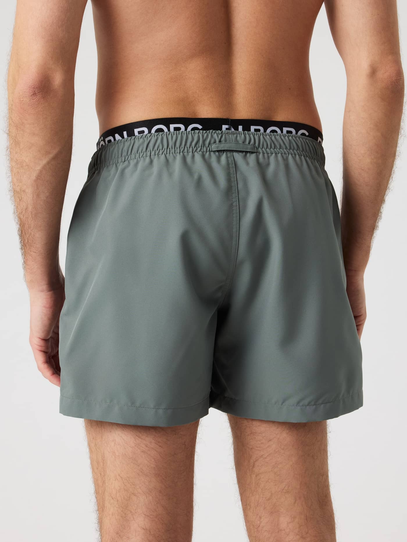 Borg Elastic Swim Shorts i Balsam Green (Grøn) set bagfra med sort og hvid logo-elastik i taljen. - Image 2
