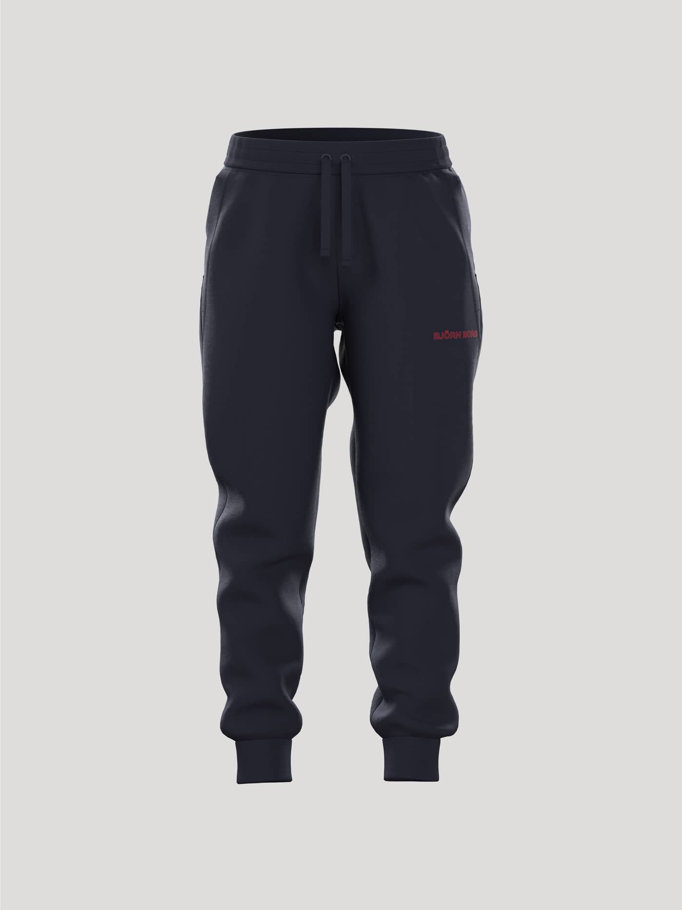 Borg Essential 3 Sweatpants för barn i Night Sky (Blå) framifrån med en liten röd logotyp på benet. - Image 1