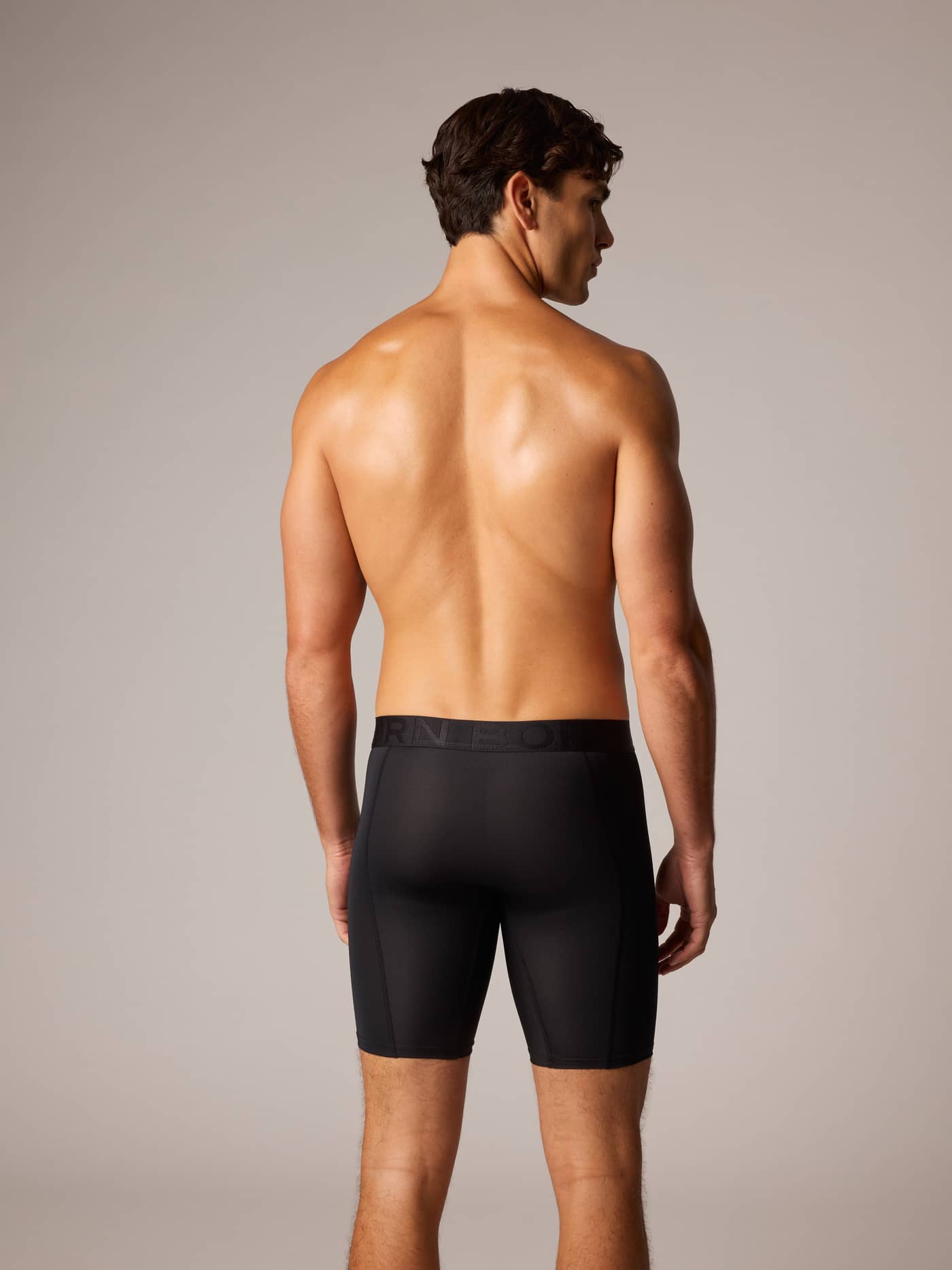 Sports Lightweight Long Leg Boxers 2-pack in black training microfibre with a tonal black logo, seen from the back on a man. - Image 2