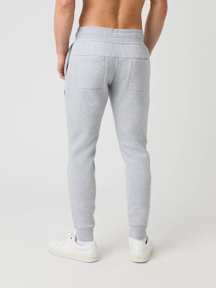 Achteraanzicht van de Björn Borg Centre Tapered Sweatpants in Light Grey Melange (Grijs) met een slanke pasvorm. - Image 2
