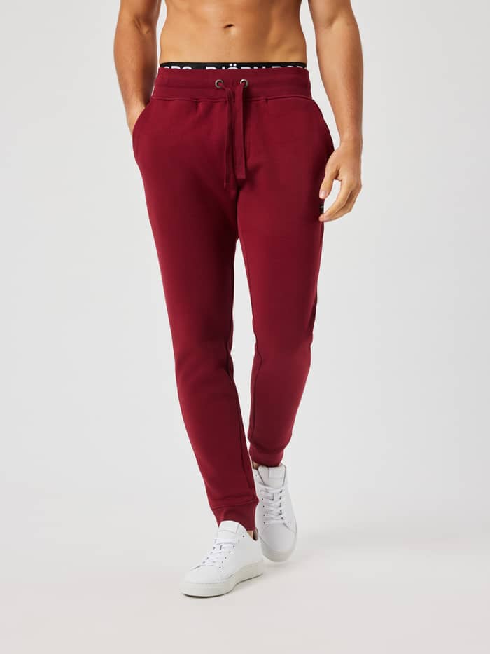 Front view of the Centre Tapered Sweatpants in Cabernet (Burgundy) featuring an elastic waistband and drawstring.