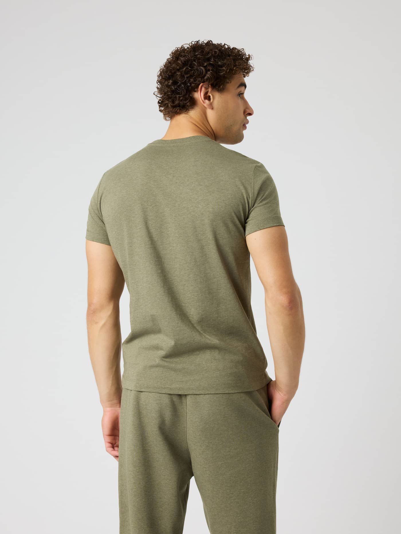 Back view of the Centre T-Shirt in Winter Moss Melange (Green), a regular-fit essential in soft cotton jersey. - Image 2