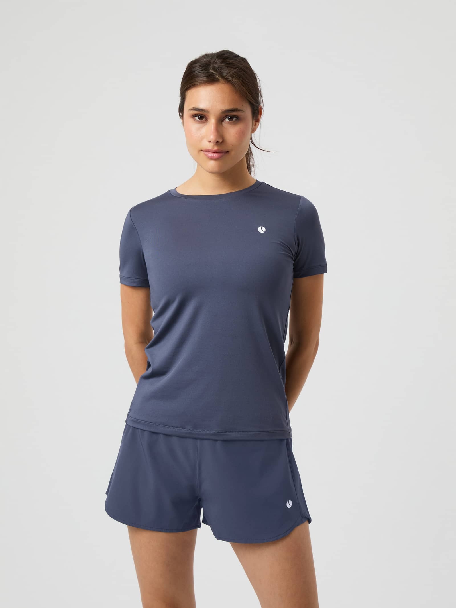 Front view of a model wearing the Björn Borg Ace Slim T-Shirt in the color Odyssey Gray. - Image 1