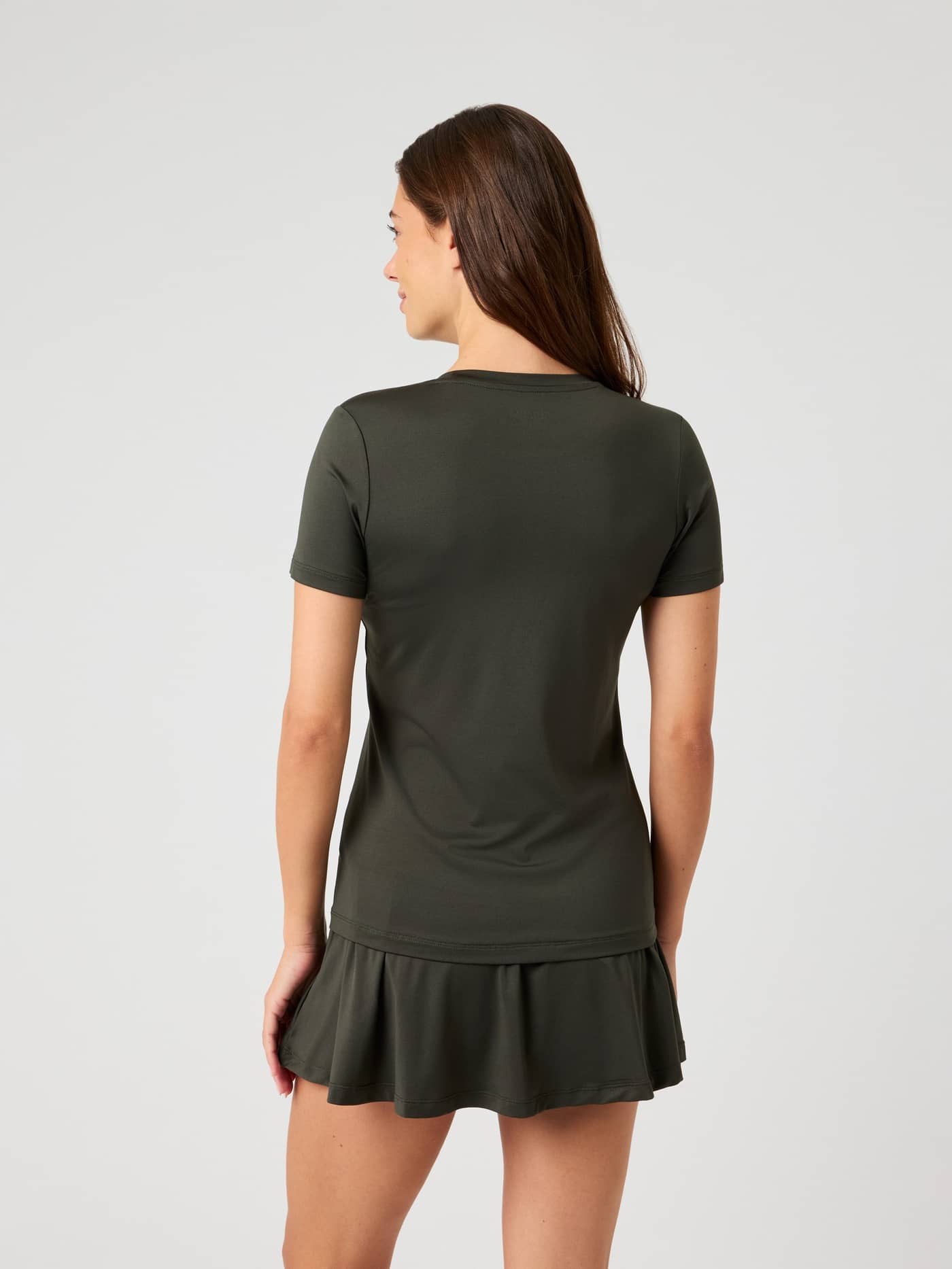 Back view of a woman wearing the Björn Borg Ace Slim T-Shirt in Peat. - Image 2