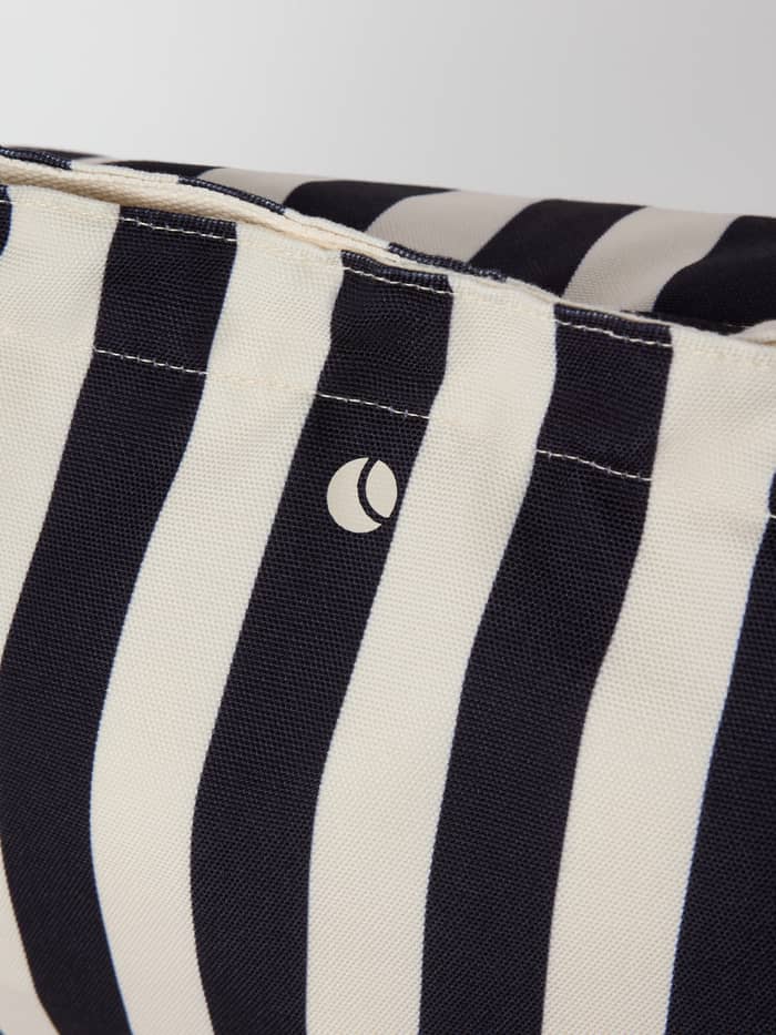 Borg Beach Tote M - 27L in Black Beauty (Black) showcasing the classic striped pattern and small cream logo. - Image 5
