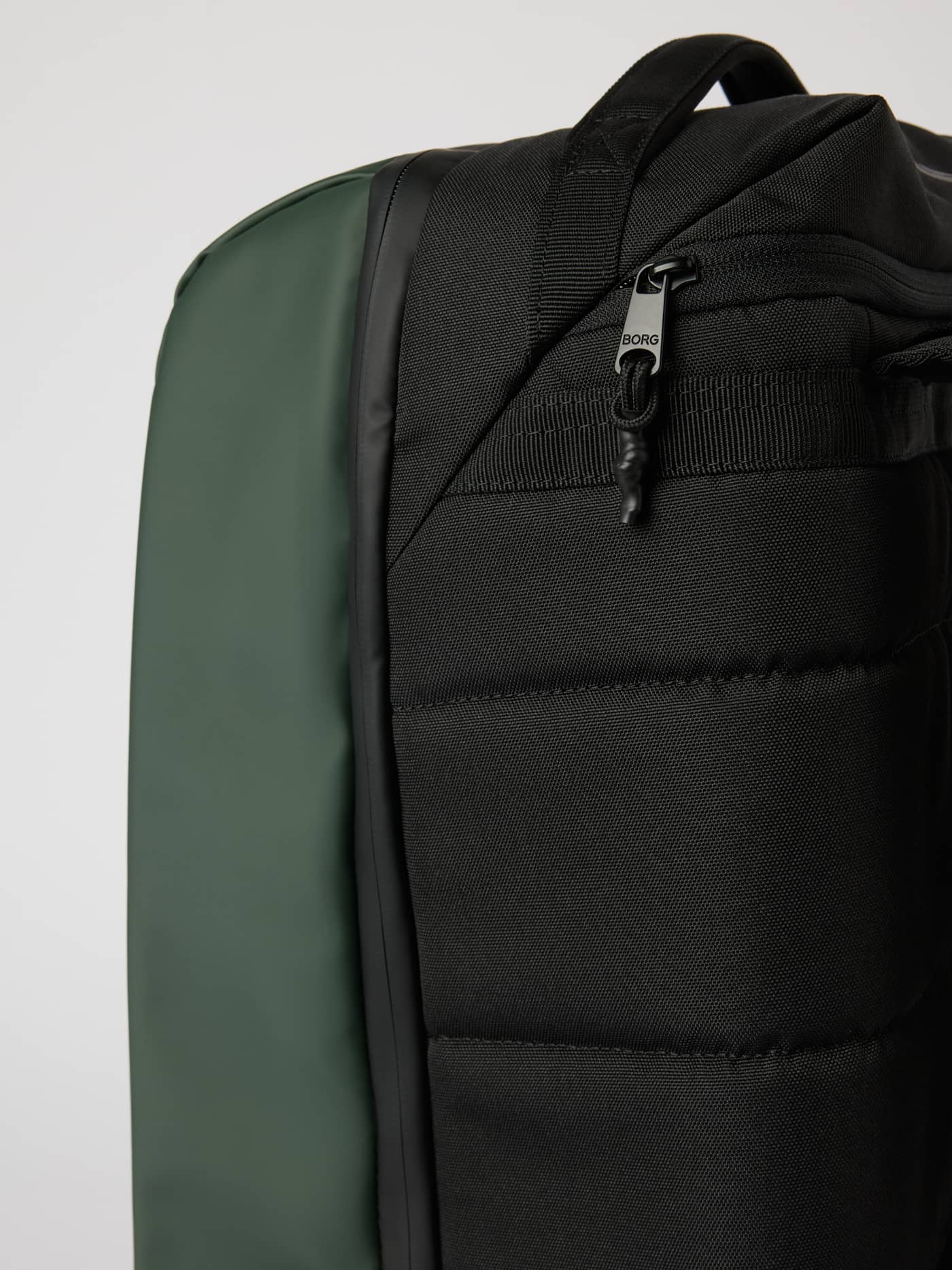 Travel City Backpack 30L in Mountain View (Green) with durable polyester, a padded back panel and a black BORG logo zipper. - Image 4