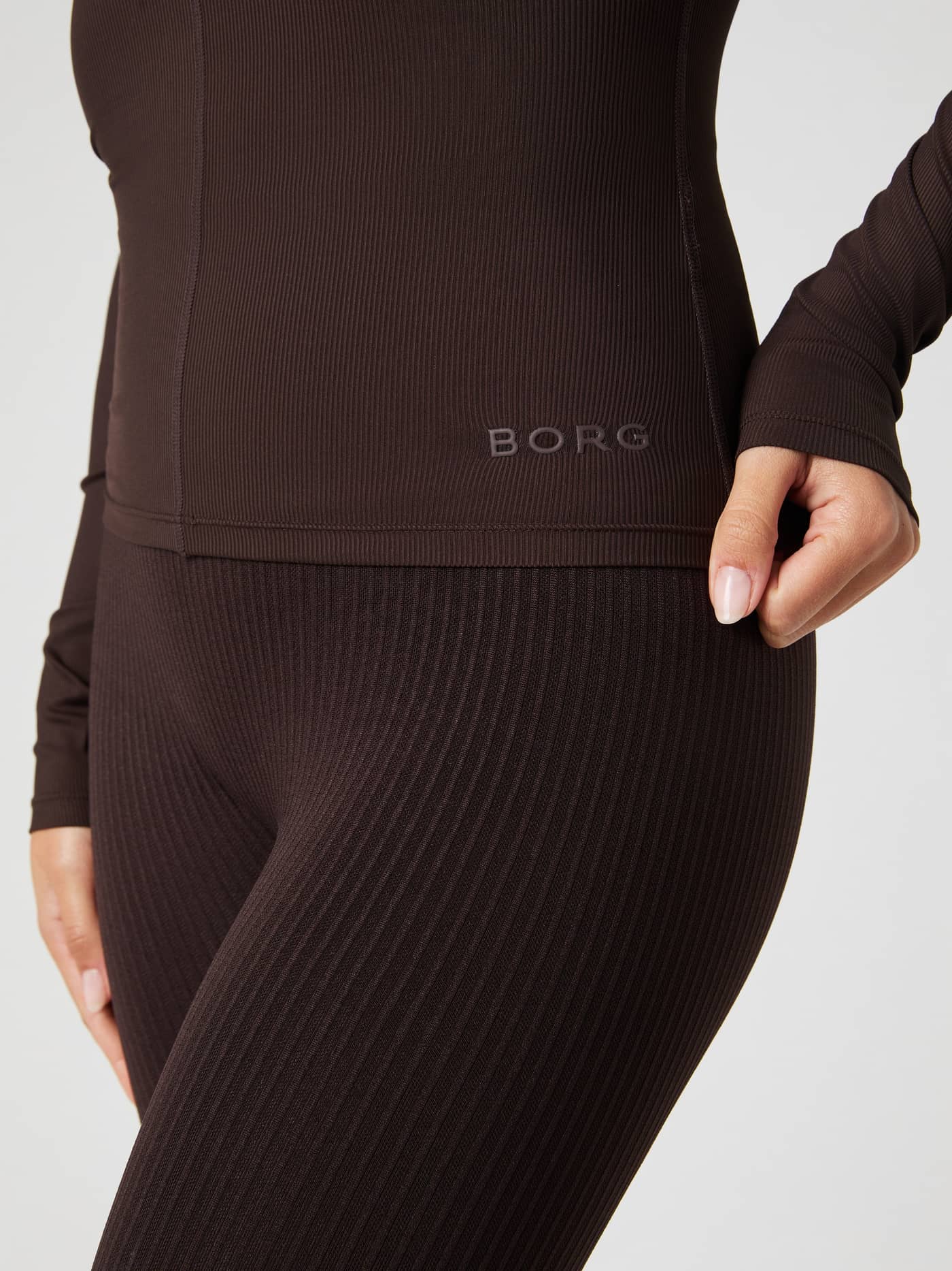 Detailed close-up of the training Studio Ballerina Long Sleeve in Molé (Brown), showcasing the slim fit and ribbed fabric. - Image 7
