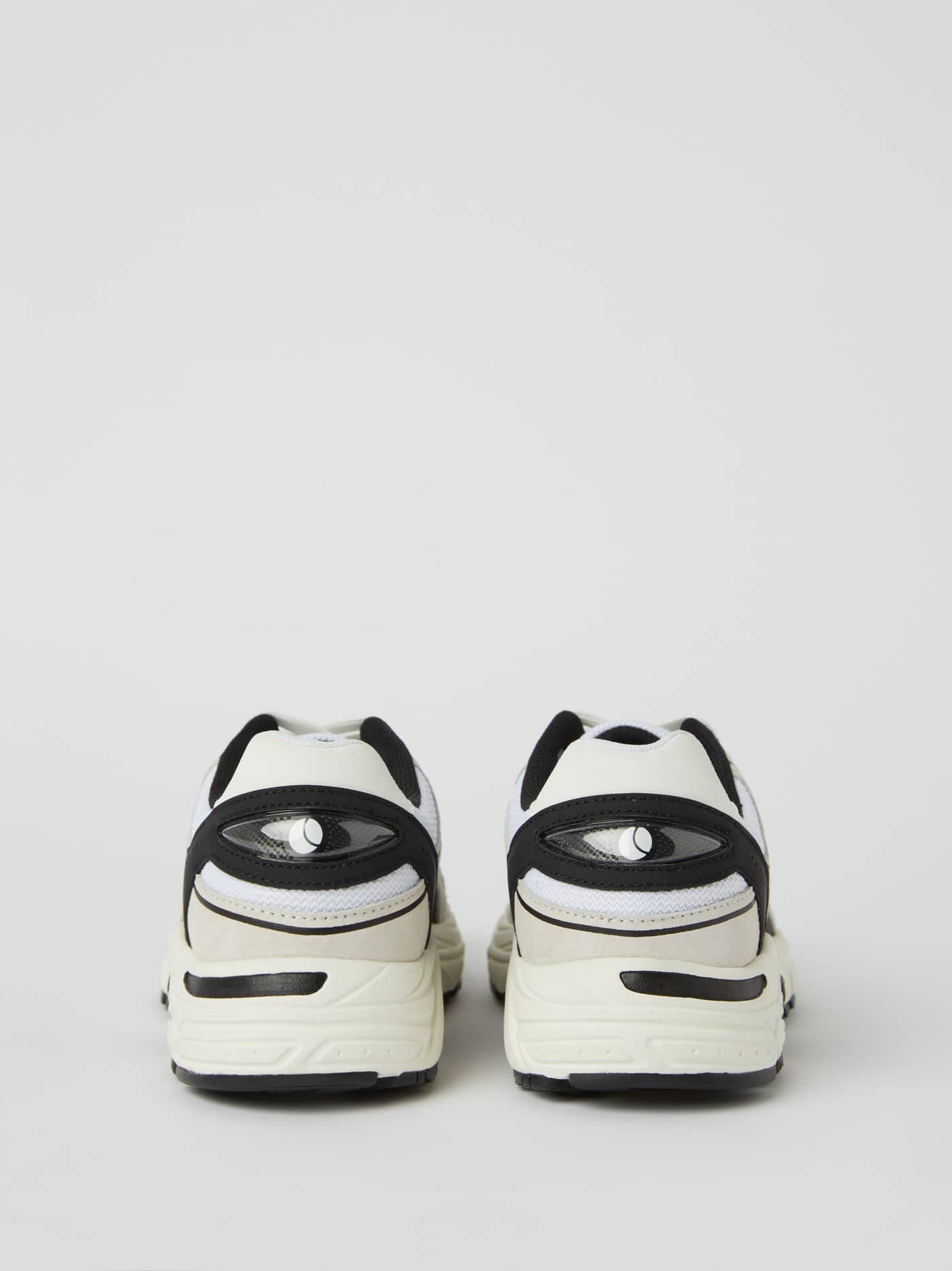 Back view of the white Women's Alley Sneakers, featuring a supportive heel for stability and running performance. - Image 3