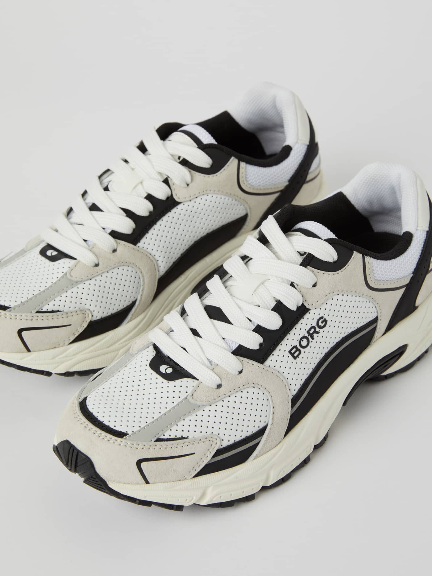 White Women's Alley Sneakers featuring perforated leather panels, a black BORG logo, and supportive cushioning for running. - Image 4