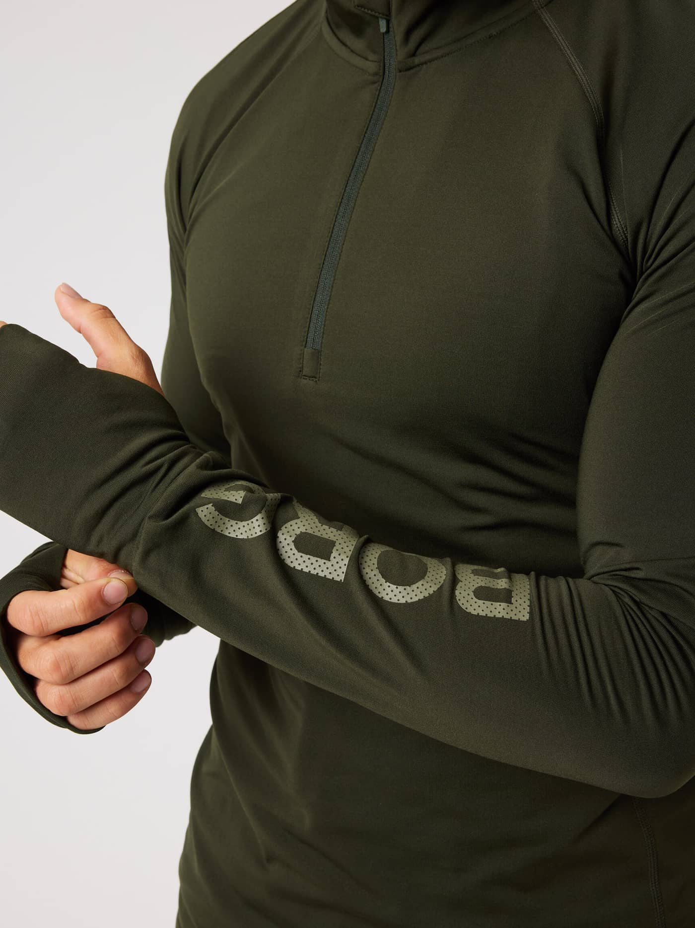 Borg Midlayer Half Zip in Rosin (Green) for training, featuring functional thumbholes and a perforated sleeve logo. - Image 5