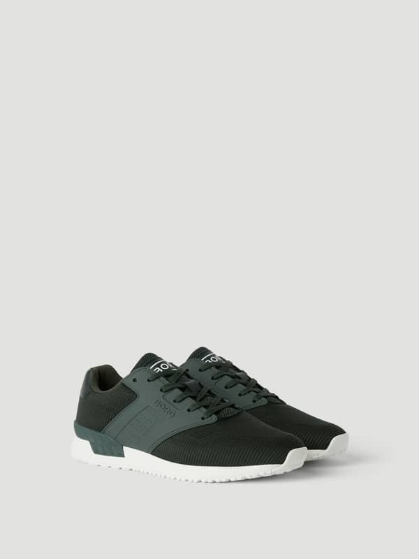 Men’s sneakers R140 Knit vertes à tige tricotée respirante avec logo blanc alliant style et performance pour le running.