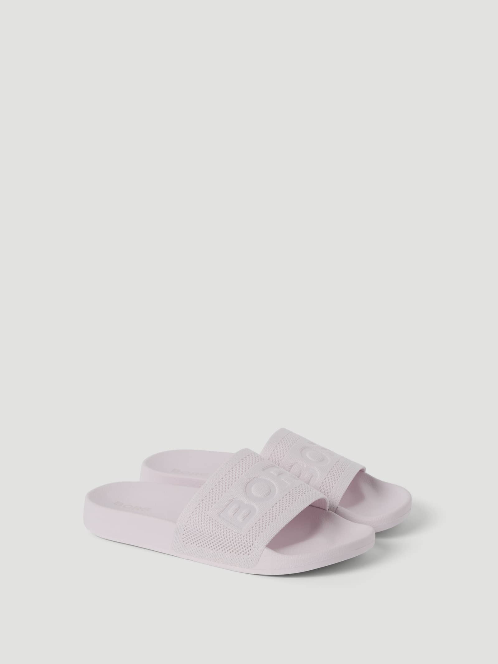 Purple Women's Knox Slides featuring a knitted polyester upper and large Borg logo for a stylish and comfortable leisure fit. - Image 1