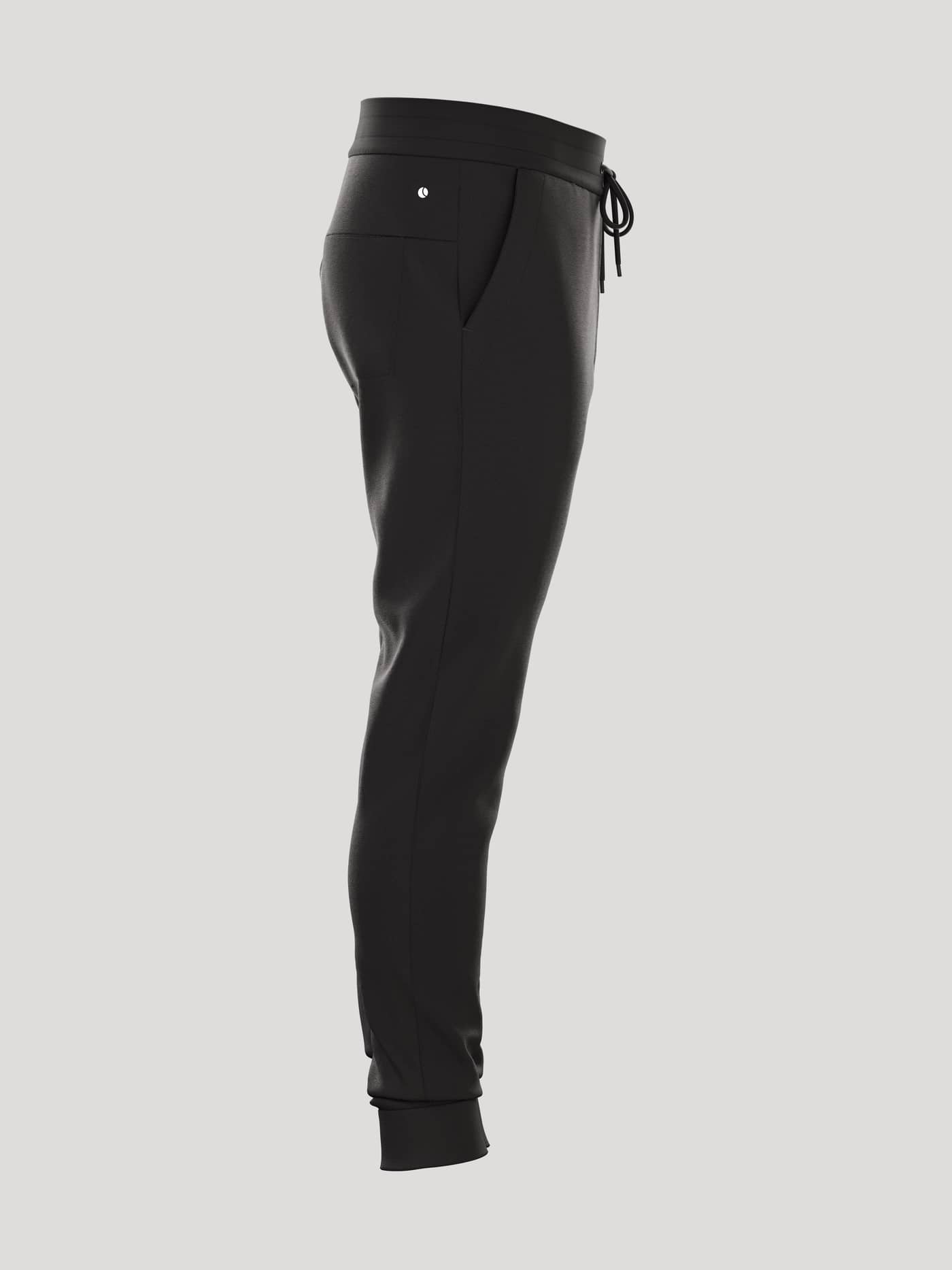Vista lateral de los Borg Essential 1 Sweatpants para hombre en Black Beauty (Negro) con ajuste relajado y logo blanco. - Image 2