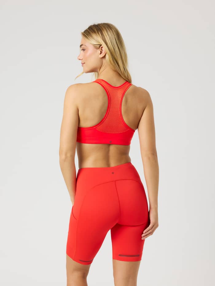Back view of the Borg Mid Support Sports Bra in Flame Scarlet (Red) with a breathable mesh racerback, ideal for training. - Image 2