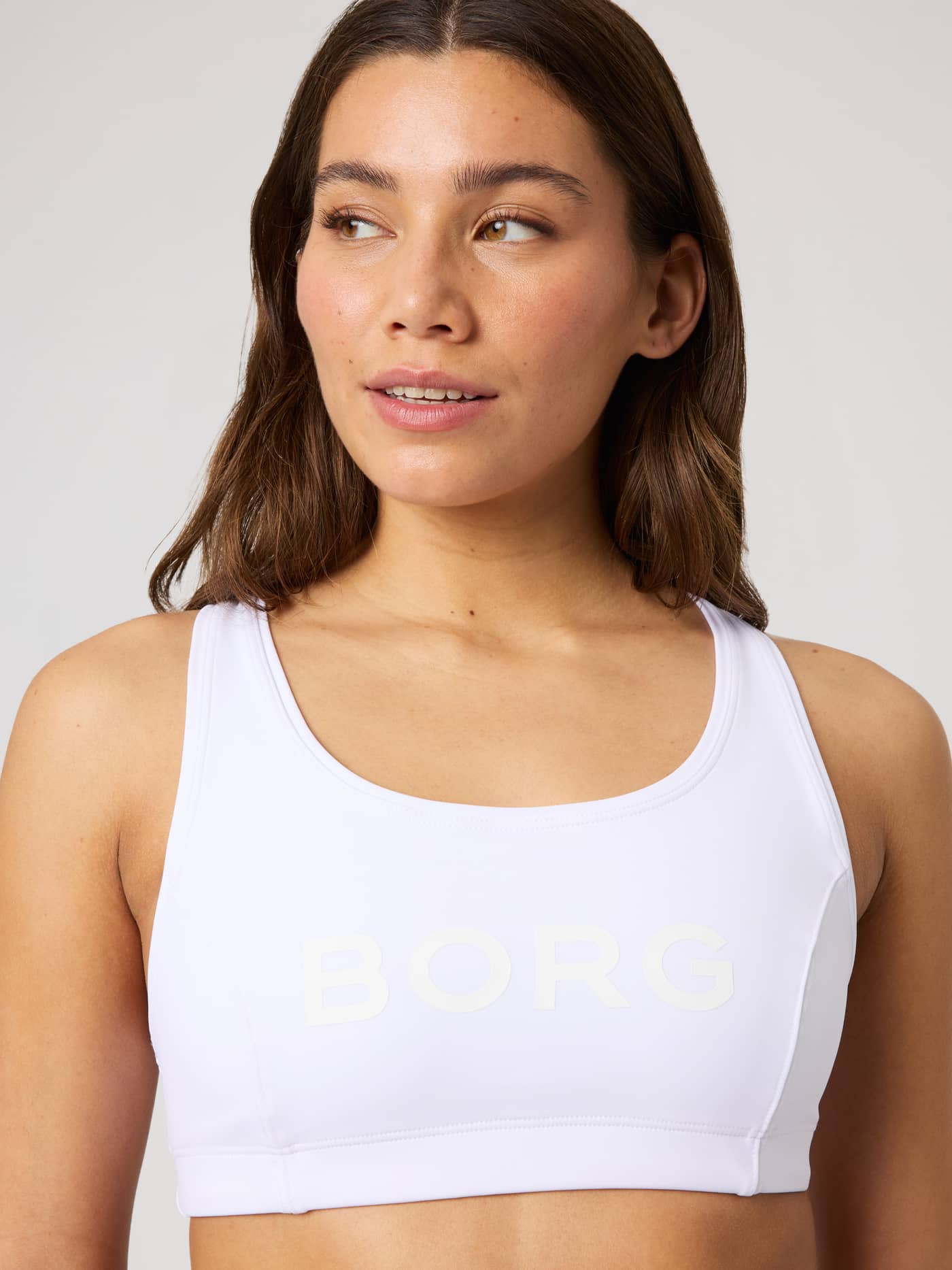 Borg Mid Support Sports Bra in White with a tonal logo, designed for comfortable support during training. - Image 5