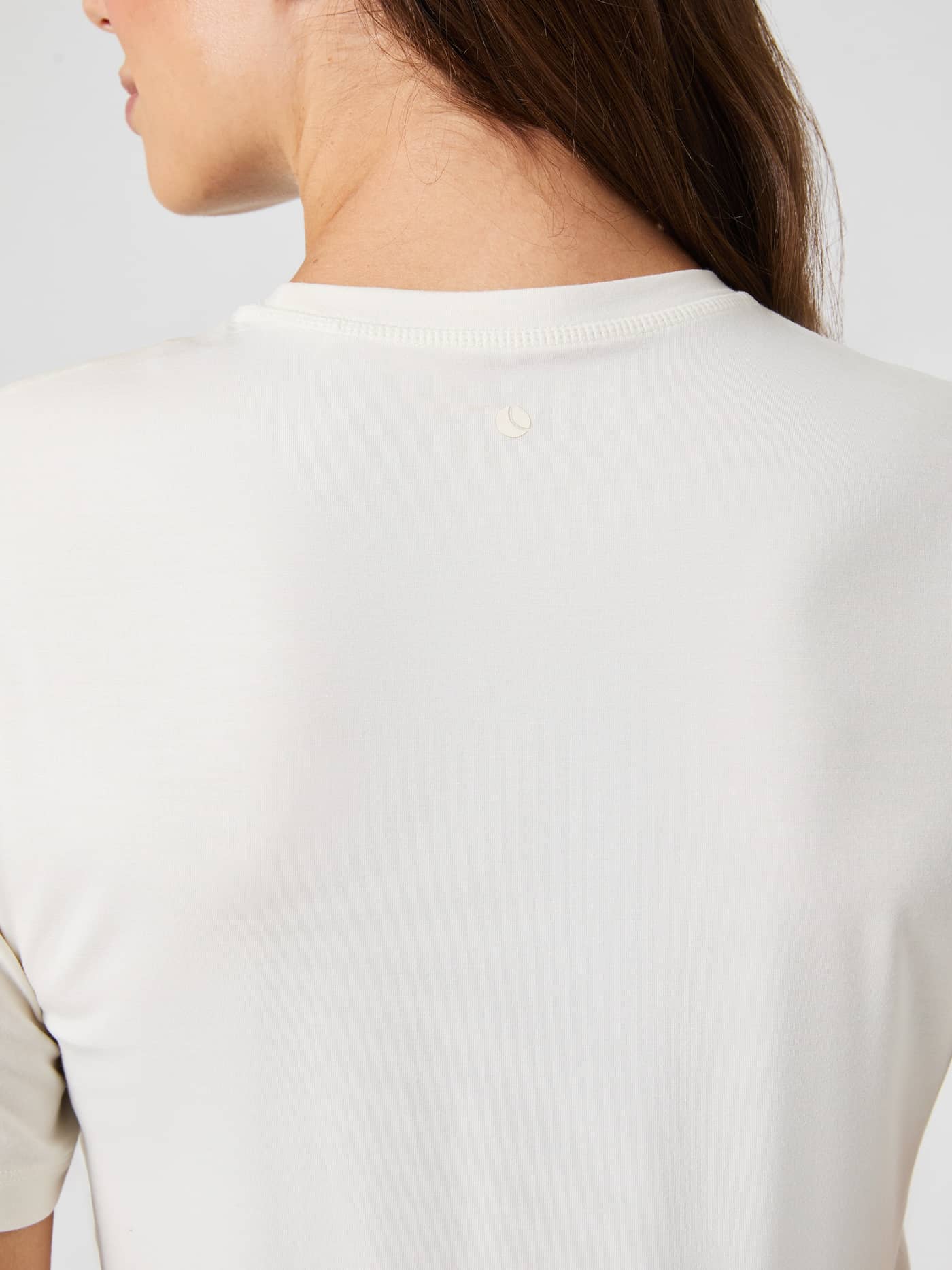 Back view of the training Björn Borg Studio Soft T-Shirt in Tofu (White), featuring a tonal logo and soft modal fabric. - Image 6