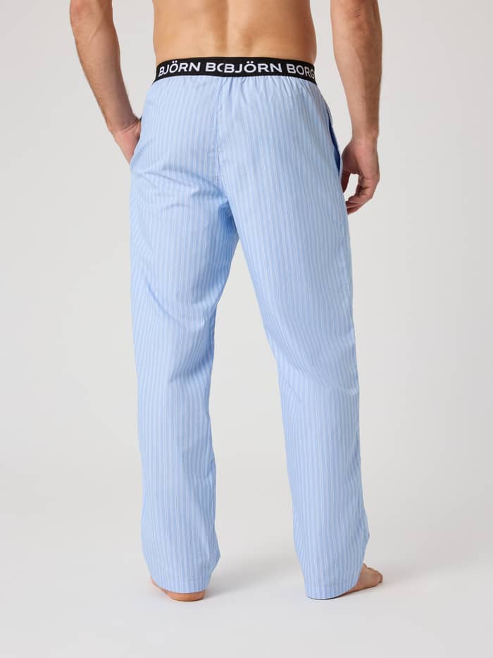 Core Woven Logo Pyjama Pants in Anglo Stripe 2 (Blau) mit Streifenmuster und weißem Logo-Bund in der Rückansicht. - Image 3