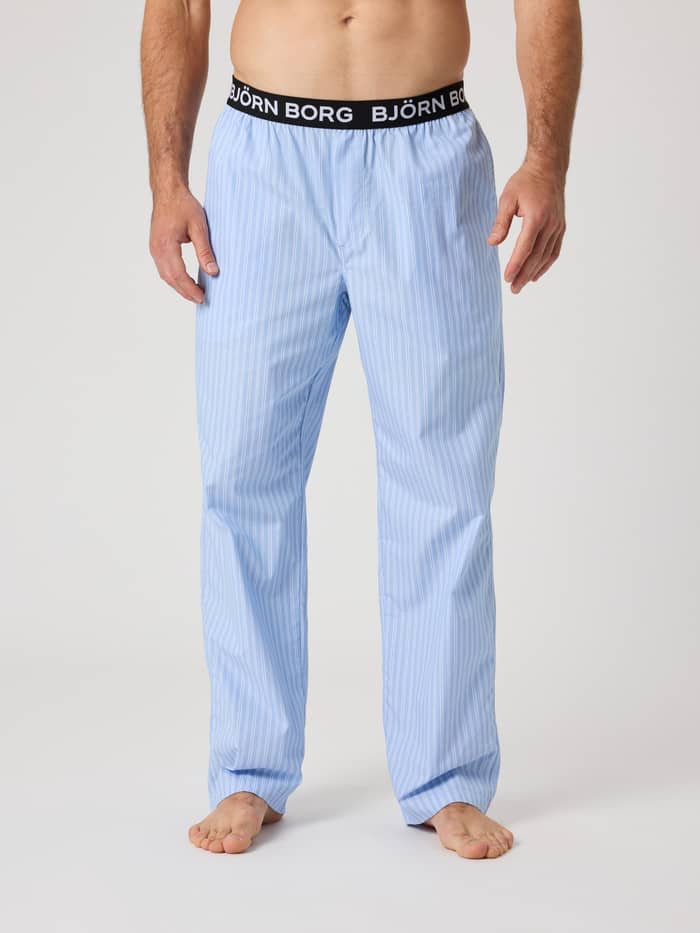 Gestreifte Björn Borg Core Woven Logo Pyjama Pants in Anglo Stripe 2 (Blau) mit weißem Logo-Bund in der Vorderansicht. - Image 2